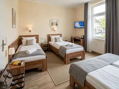 Dreibettzimmer